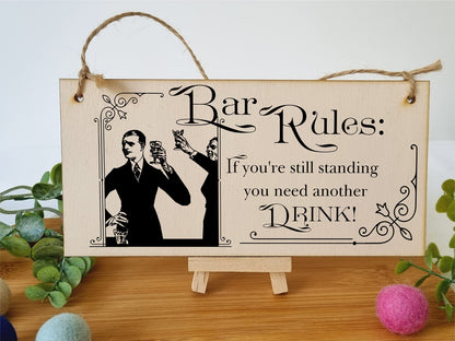 The Plum Penguin Handmade Wooden Hanging Wall Plaque Bar Rules Still Standing Need a Drink Funny Novelty Sign Home Bar