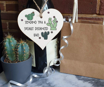 The Plum Penguin Handmade Wooden Hanging Heart Plaque Gift sending you a socially distanced hug miss you long distance novelty wall hanger cute fun cactus design for family friends grandparents