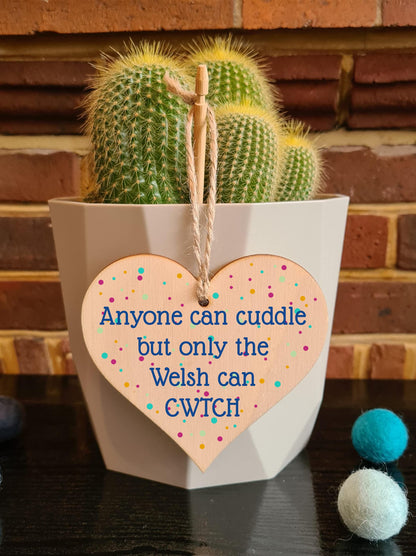 The Plum Penguin Handmade Wooden Hanging Heart Plaque Gift Cuddle Welsh Cwtch Fun Novelty Wall Hanger Decoration Friendship Family Love