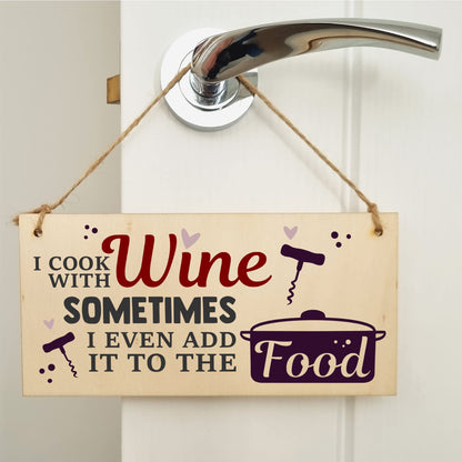 The Plum Penguin I Cook With Wine Funny Novelty Handmade Wooden Hanging Wall Plaque Gift Kitchen Home Bar Sign Decoration
