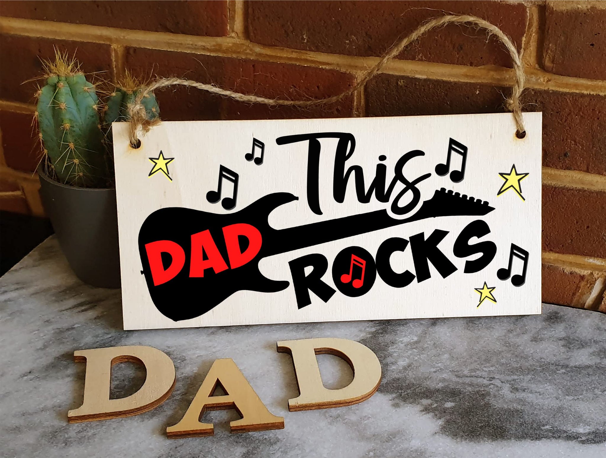 The Plum Penguin Handmade Wooden Hanging Wall Plaque This Dad Rocks Fun Guitar Music Novelty Sign Man Cave Office
