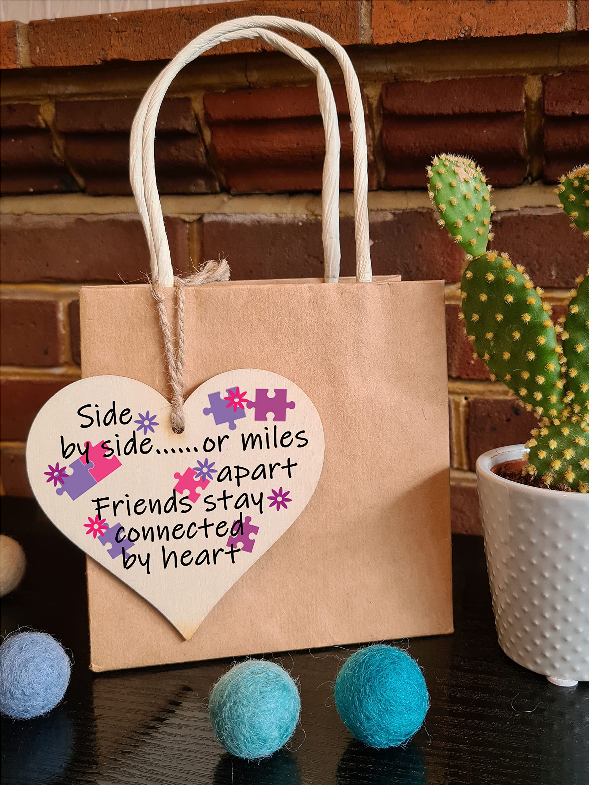 The Plum Penguin Loving Hearts Trio Celebrating Friendship in Each Design