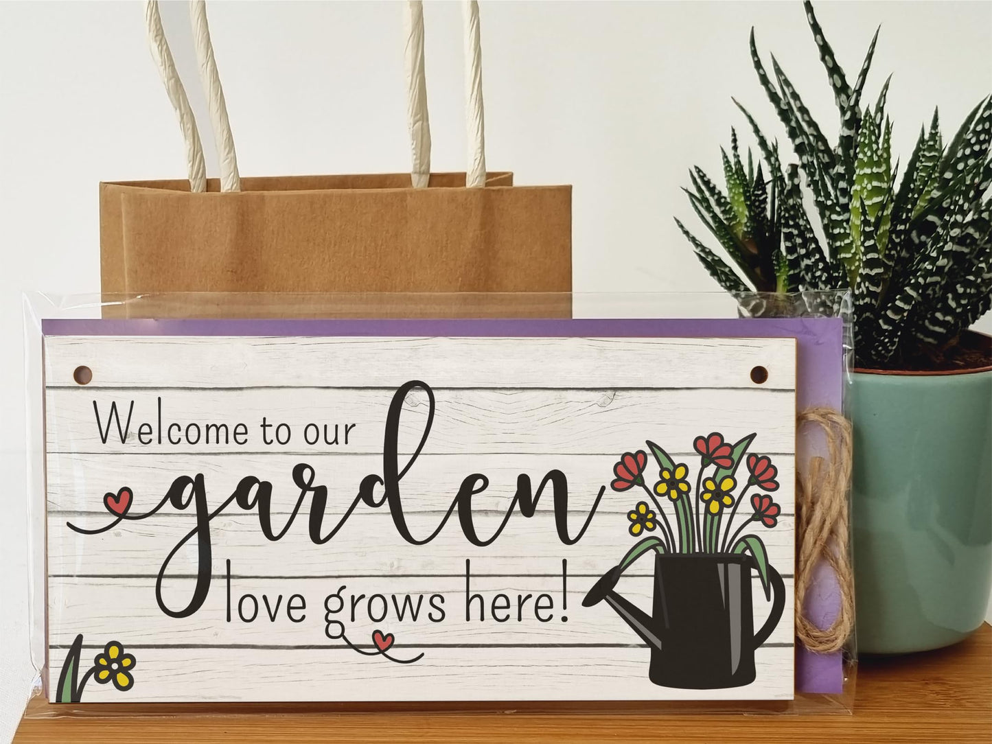 The Plum Penguin Welcome to Our Garden Love Grows Decorative Rustic Gift Handmade Wooden Plaque Home Décor Hanging Sign Family