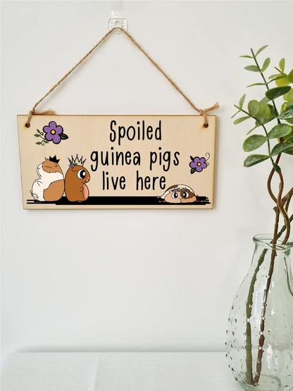 The Plum Penguin Handmade Wooden Hanging Wall Plaque Spoiled Guinea Pigs Live Here Pet Lover Mum Dad Sign